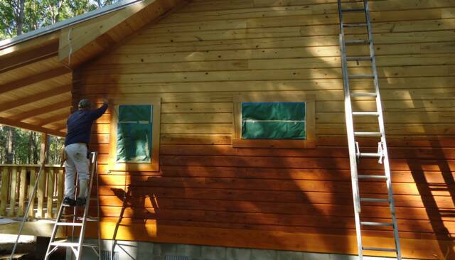 cypress log cabin staining
