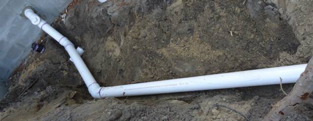 plumbing septic tank tie-in