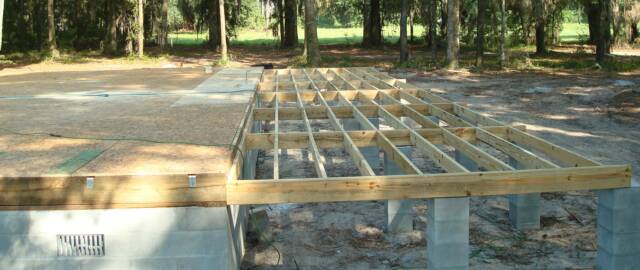 log home porch sub-floor system
