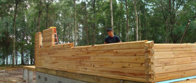 Flat x Flat Cypress Logs with dovetail corners by Log Home Guys