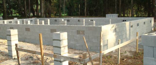 Shamrock log home foundation by Log Home Guys of Florida
