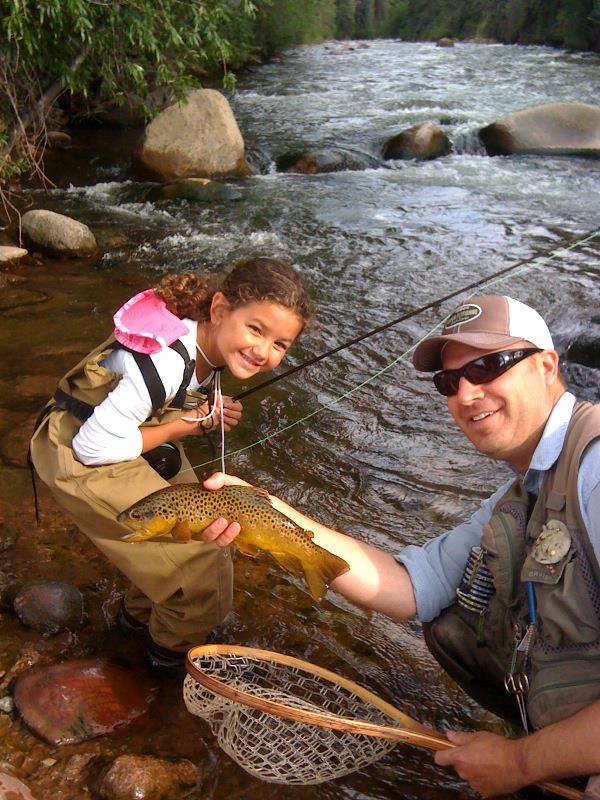 log cabin by the trout stream